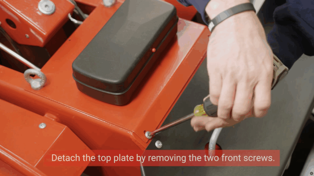 #1 Detach the top plate by removing the two front screws.