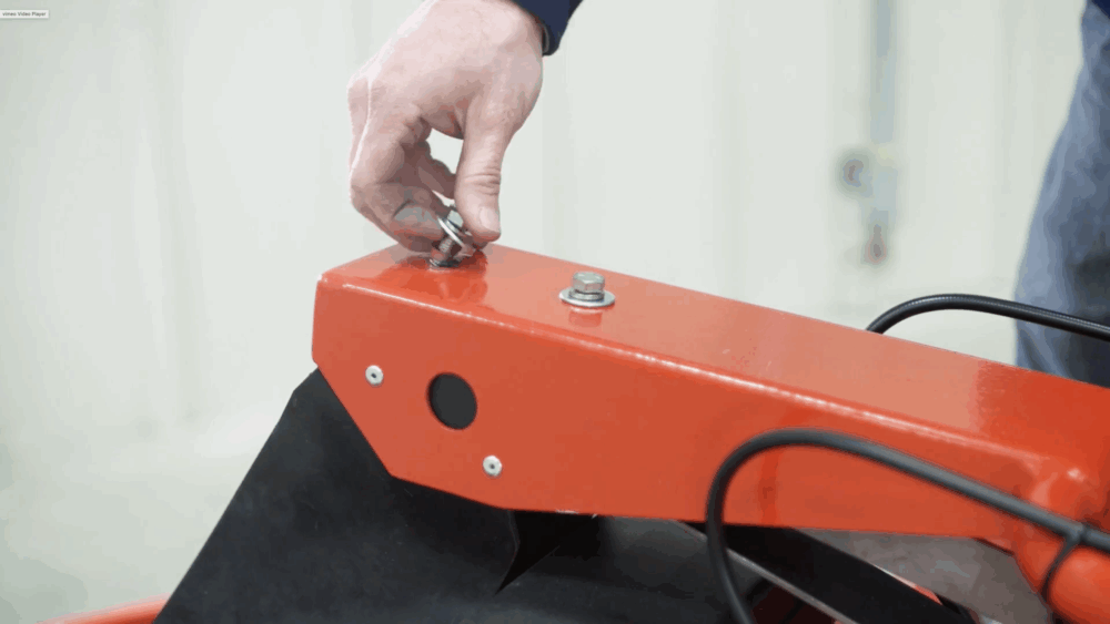 #1 Remove the two screws at the top and center of the machine.