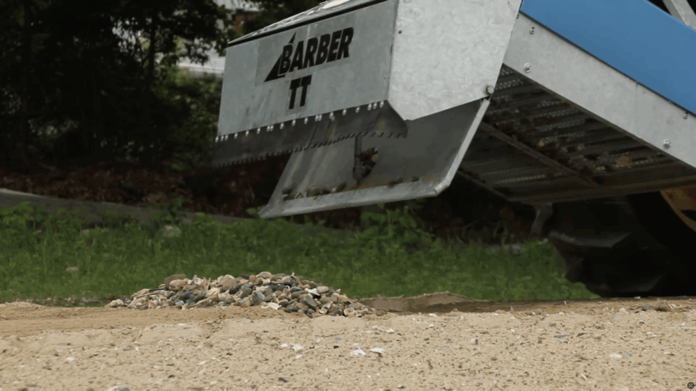 #10 Empty the hopper with the hydraulic dump.