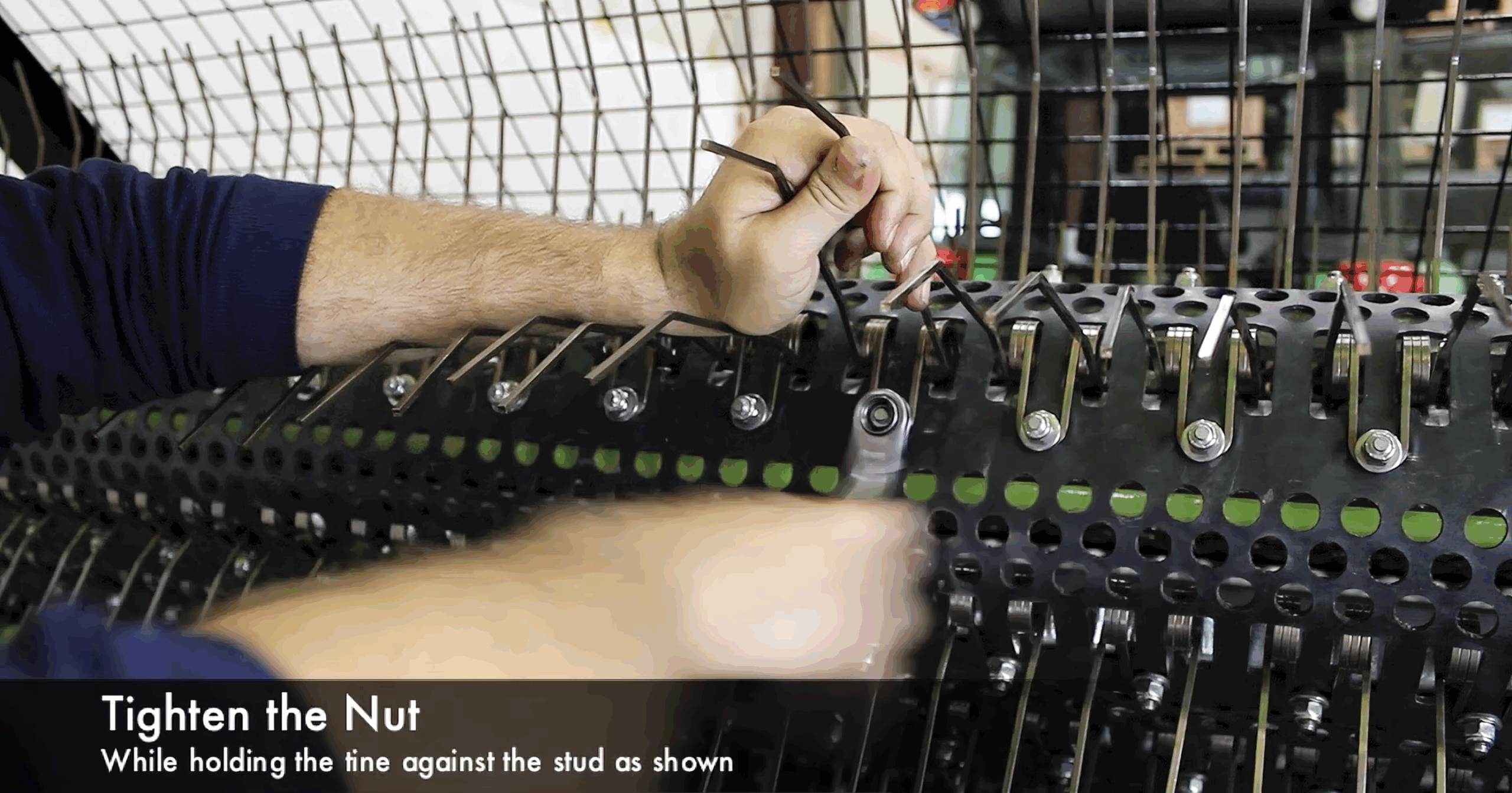 #11 Tighten the nut while holding the tine against the stud.