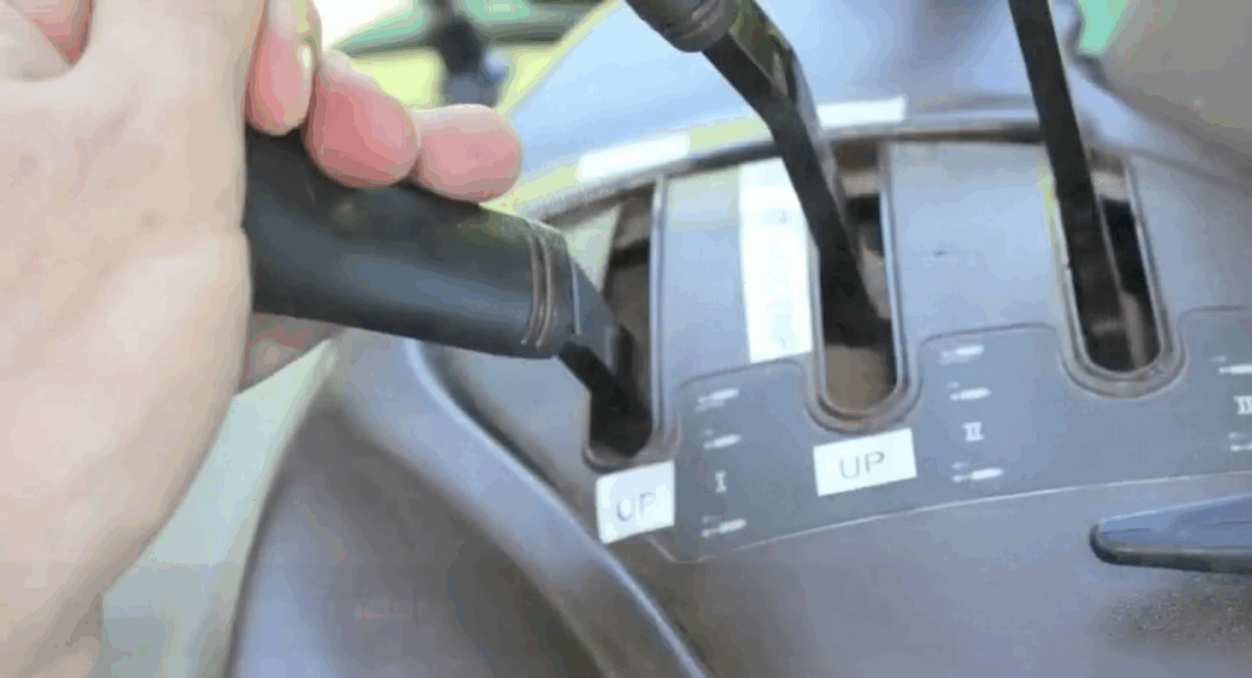 #2 Control the Moldboard height using the lever in the tractor.