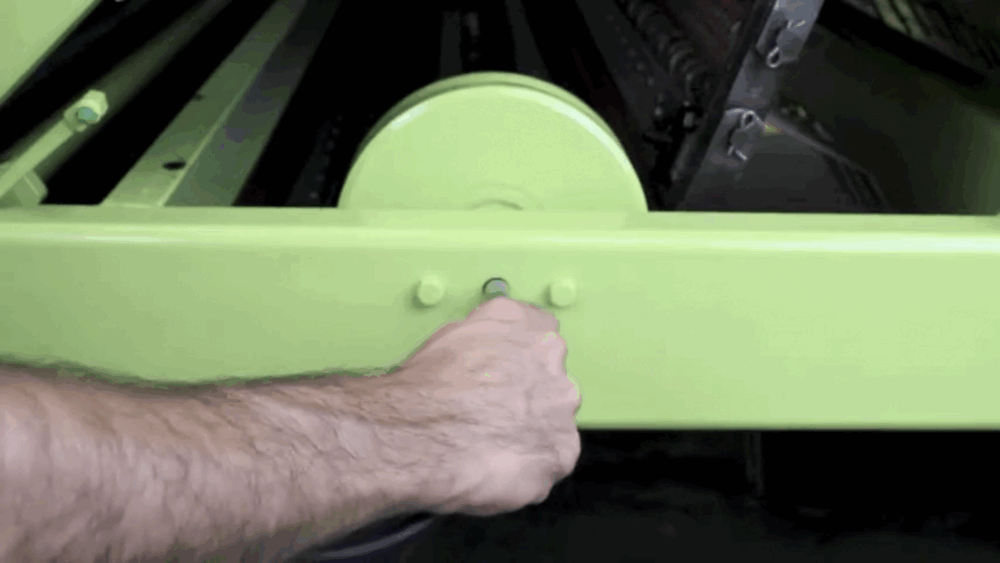 #2 Fit the grease gun’s nozzle onto the nipple.