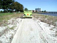 SURF RAKE cleans seaweed from beach