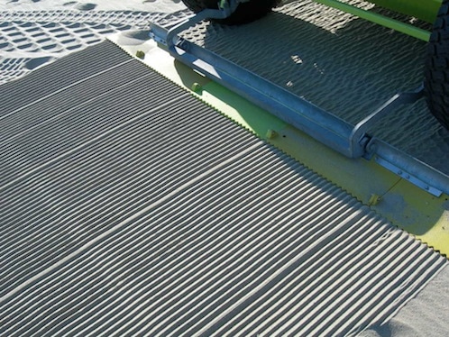 sand grooming finisher attachment on beach cleaner