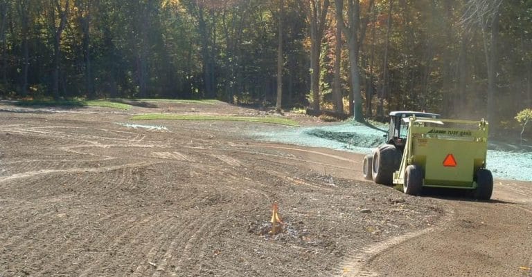 golf course construction using a stone picking machine