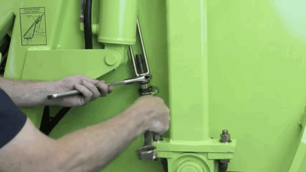 #3 To tighten the Dump Chains, start by loosening the jam-nut.