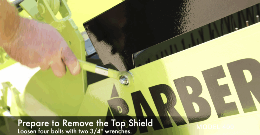 #4 Prepare to remove the top shield by loosening the four bolts with two 3 / 4” wrenches.