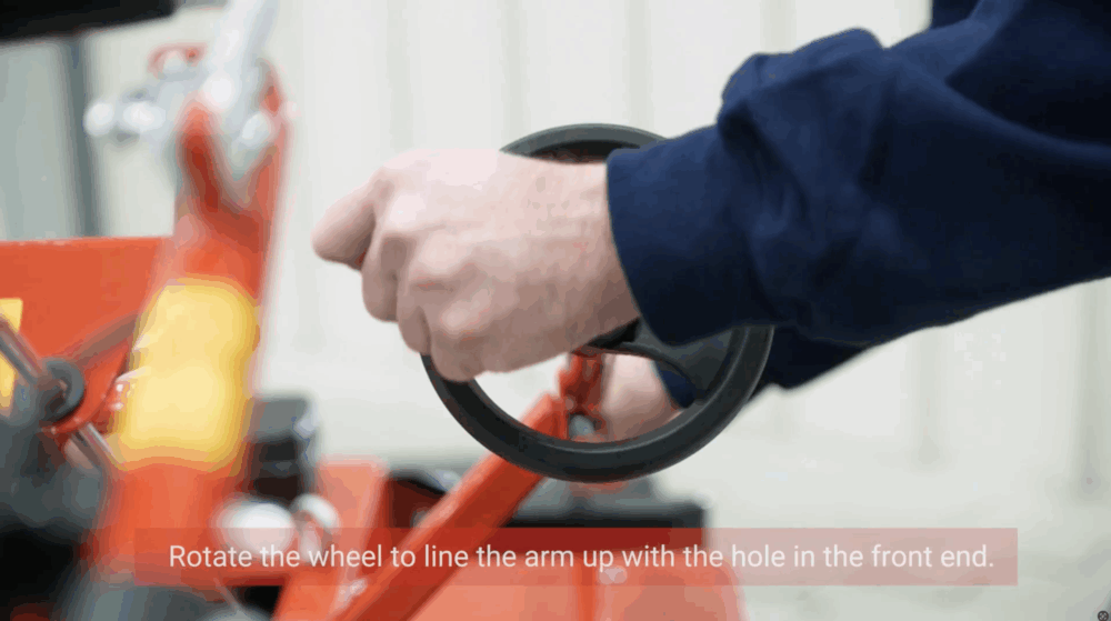 #4 Rotate the wheel to line the arm up with the hole in the front end.