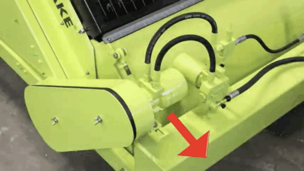 #4 To tighten the chain, move the hydraulic motor forward.