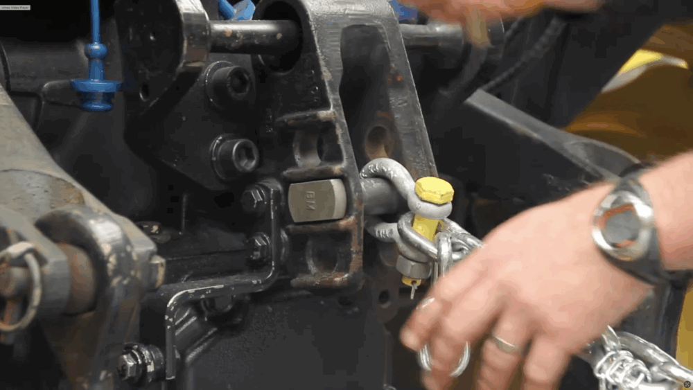 #5 Secure the TTs chain to the tractor’s upper hitch pin.