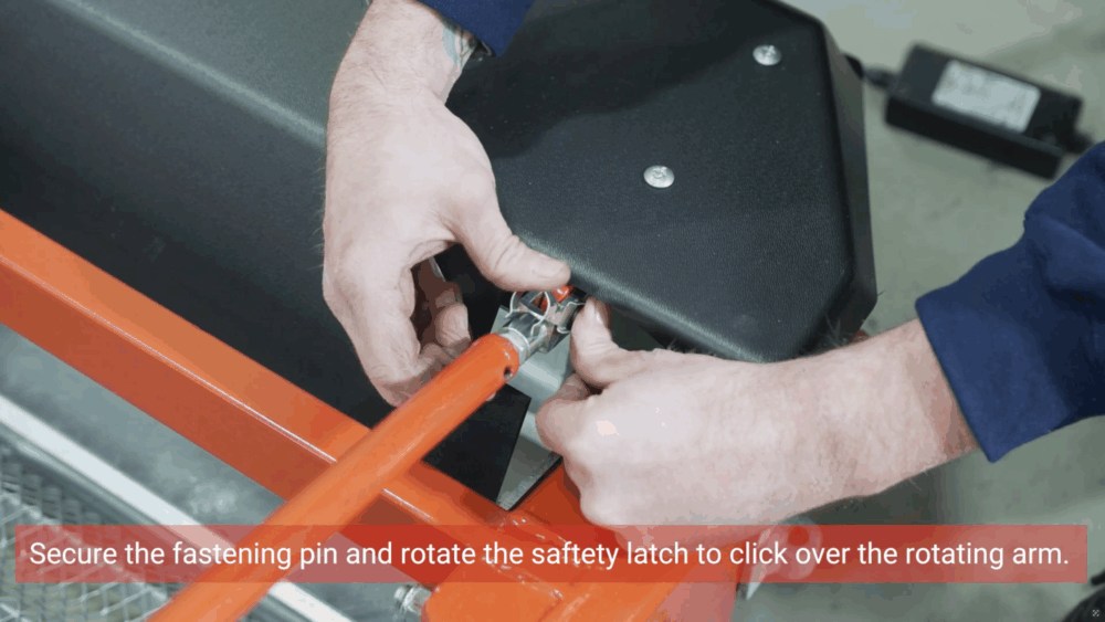 #5 Secure the fastening pin and rotate the safety latch to click over the rotating arm.