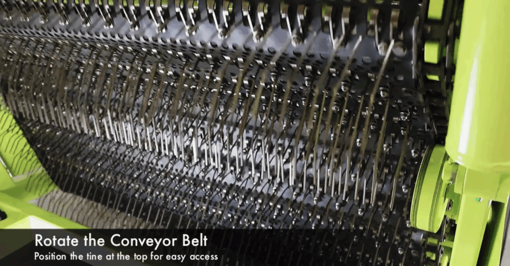 #6 Rotate the conveyor belt. Position the tine at the top for easy access.