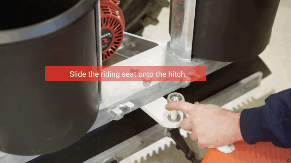 #6 Slide the riding seat onto the hitch.