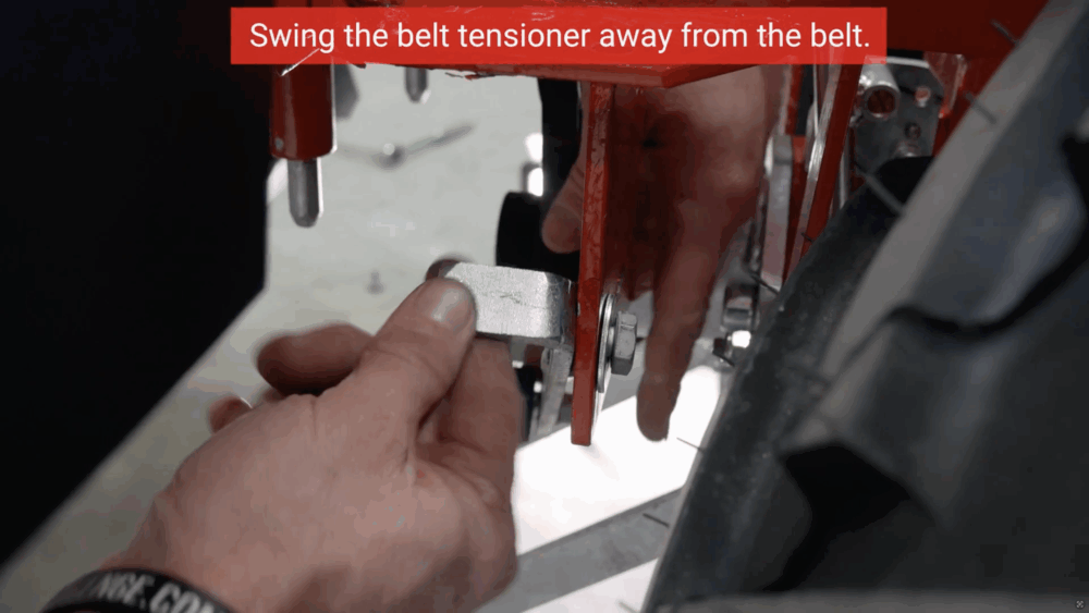 #6 Swing the belt tensioner away from the belt.