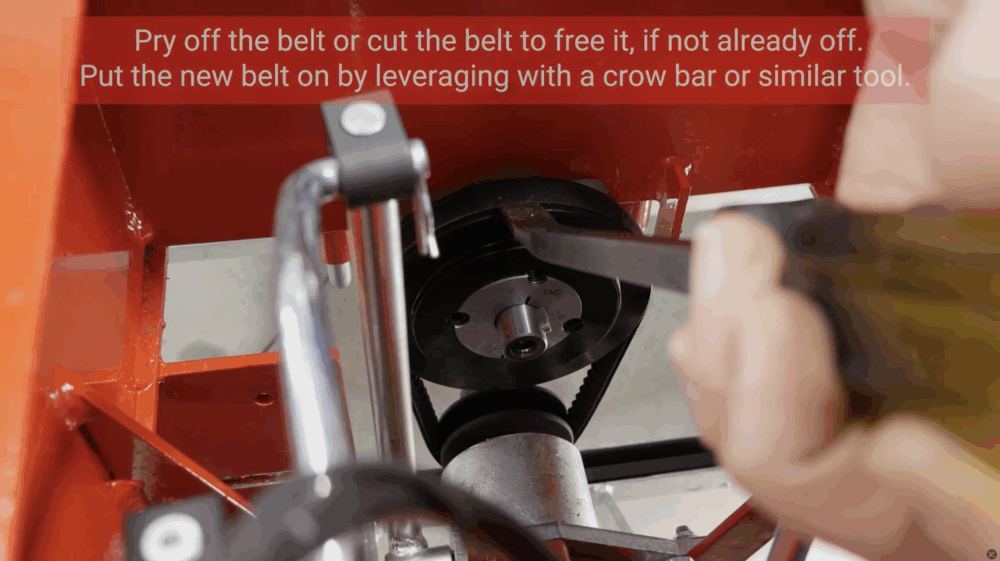#7 Pry off the belt or cut the belt to free it, if not already off. Put the new belt on by leveraging with a crowbar or similar tool.