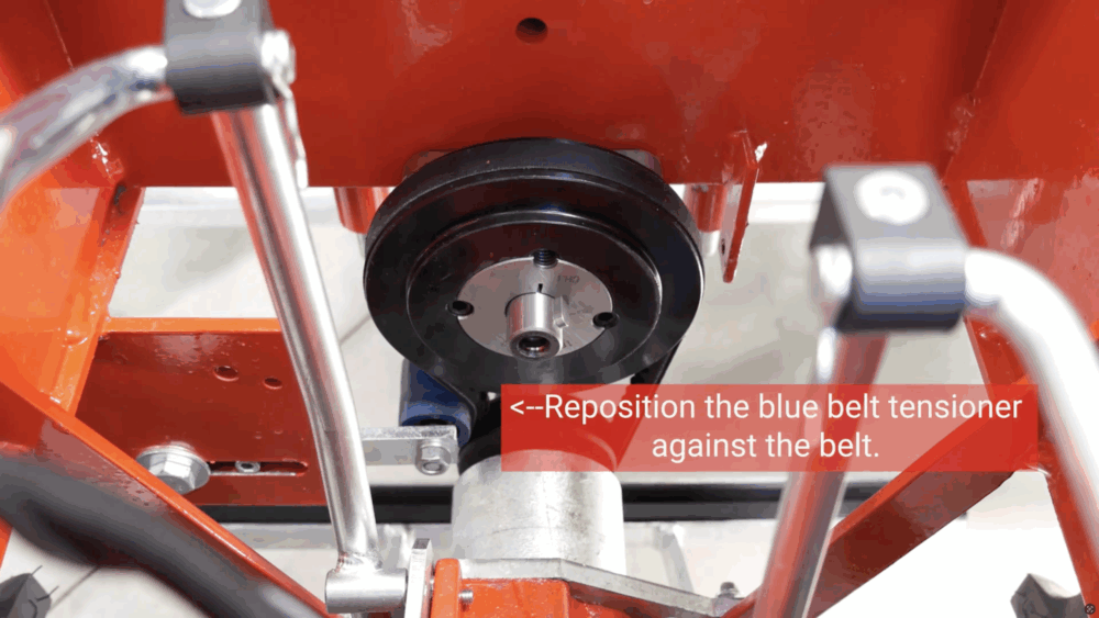 #8 Reposition the blue belt tensioner against the belt.