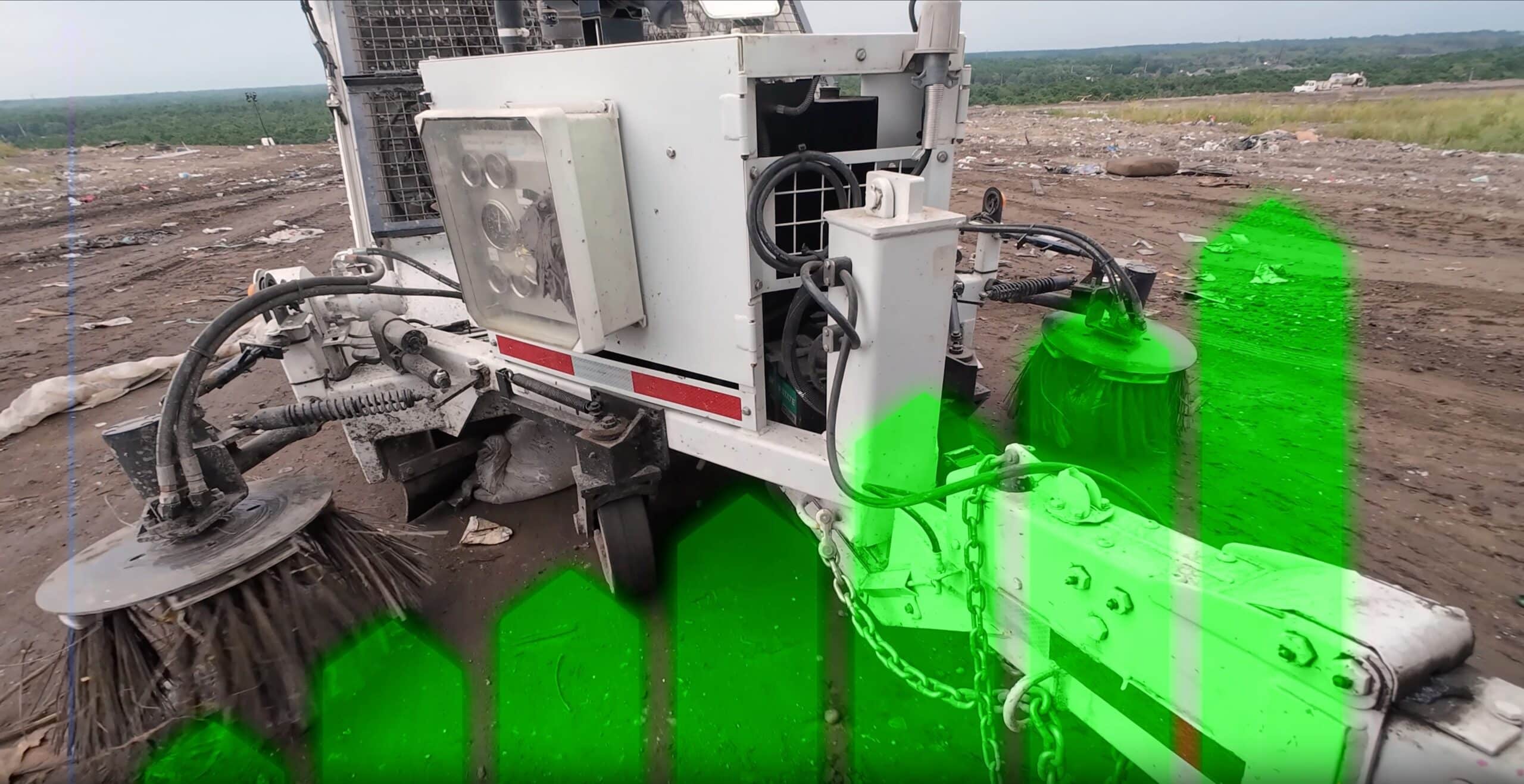 road rake helps with litter control on open face of landfill
