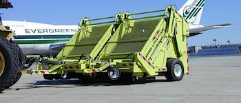 litter picker cleans airport runway